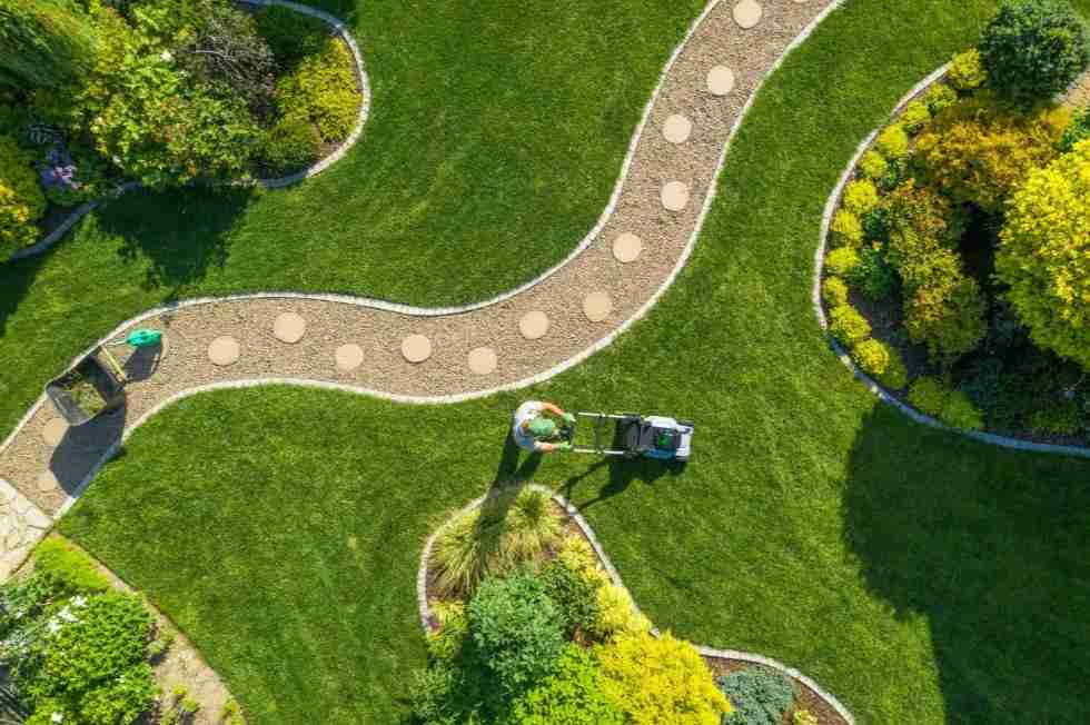 big-garden-grass-field-mowing-by-caucasian-gardener Charlotte, NC
